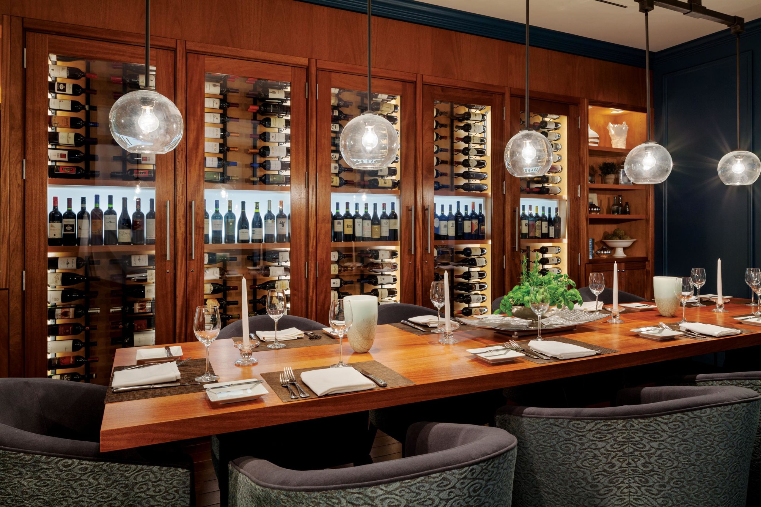 Wine cabinets shown with accent lighting in Salt Restaurant.