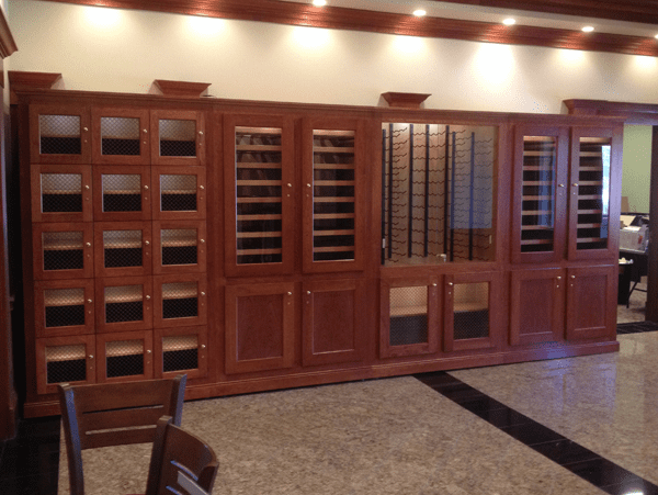 wine cabinets and wine lockers in a bank of custom cabinets by Vigilant Inc.