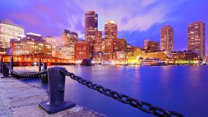 An evening aerial view of the Boston Harbor